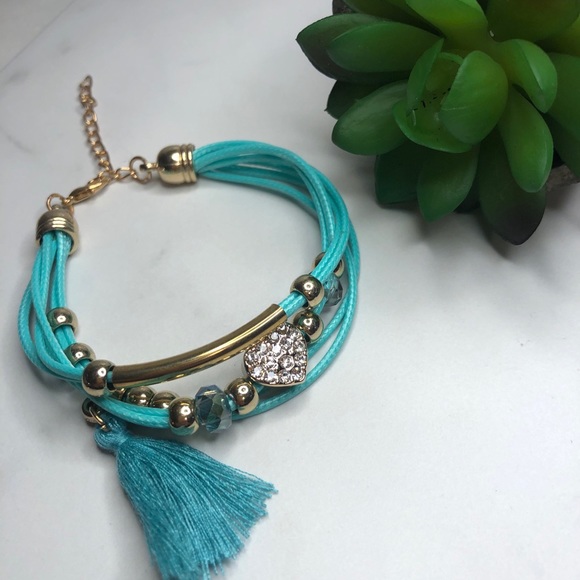 Beautiful teal banded bracelet with jeweled heart - Picture 2 of 11